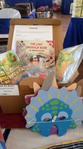 dinosaur themed pack with book, games, craft, activities, info, and movement actions.